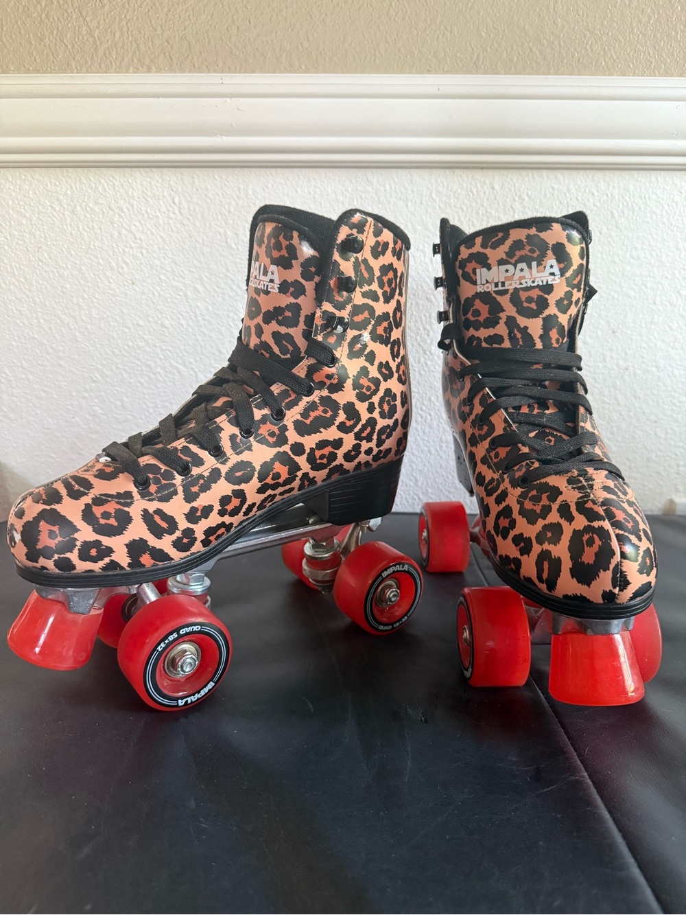 Impala Leopard Print Women's Quad Roller Skates - Orange/Black